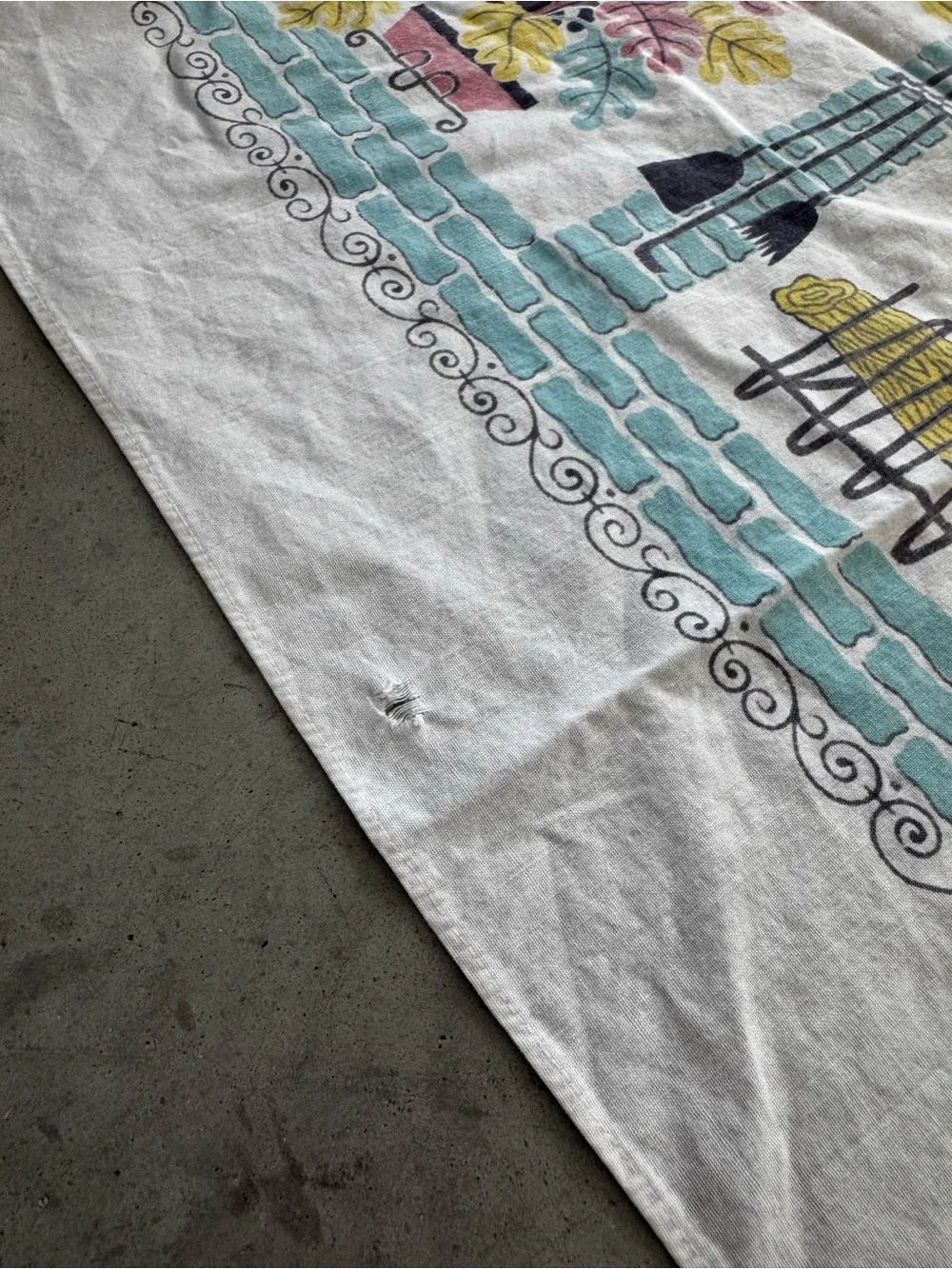 Vintage charming mid-century tablecloth featuring a rooster design with border